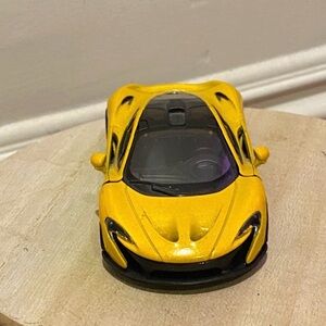 Sleek Yellow Sports Toy Car